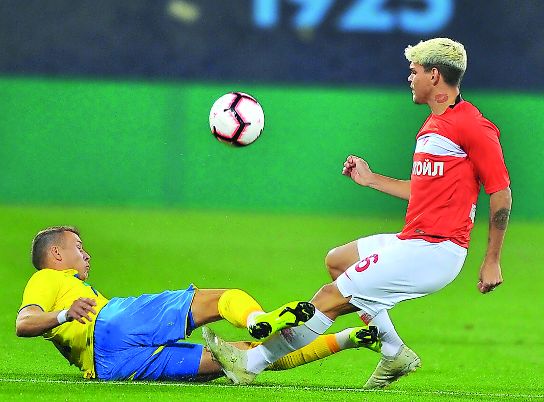 A defender of FC Rostov tackles FC Spartak’s  Ayrton Lucas (right) during the Match Premier Cup at Aspire Academy in Doha yesterday. Pics: Baher Amin/The Peninsula