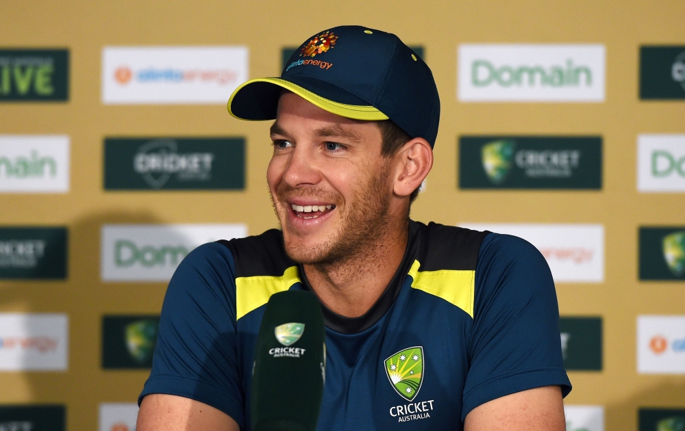 Australia's captain Tim Paine smiles during a press conference at The Gabba in Brisbane on January 23, 2019, ahead of their first day-night Test match between Australia and Sri Lanka on January 24. AFP / ISHARA S. KODIKARA