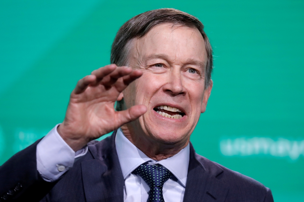 Former Gov. John Hickenlooper (D-CO) speaks at the United States Conference of Mayors winter meeting in Washington, U.S., January 24, 2019. REUTERS/Yuri Gripas