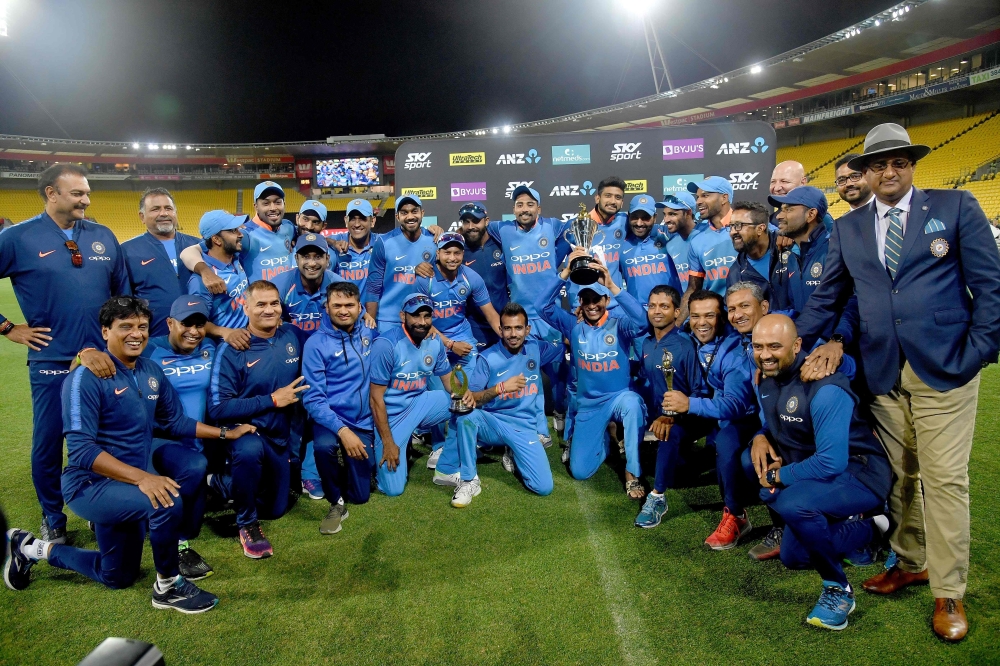 India celebrates winning the ODI series following the fifth one-day international (ODI) cricket match between New Zealand and India in Wellington on February 3, 2019. AFP / Marty MELVILLE

