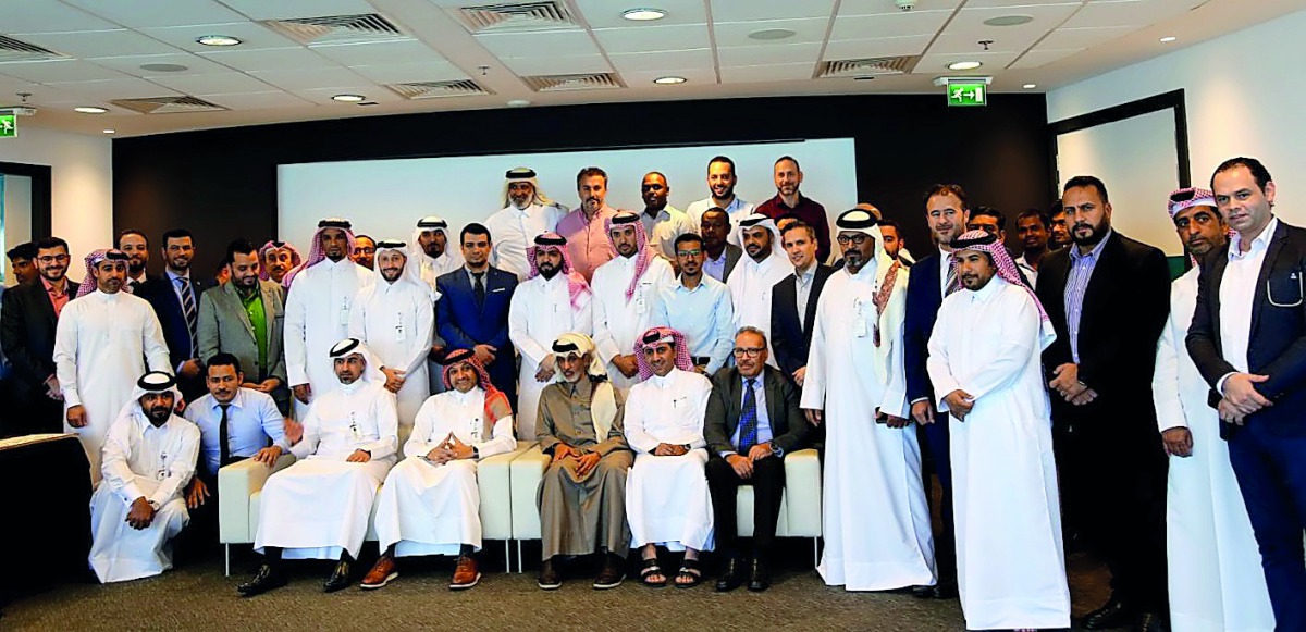 QSL President, Sheikh Hamad bin Khalifa bin Ahmed Al Thani and CEO Hani Taleb Ballan along with other officials pose for a group photo during a ceremony to celebrate Qatar’s Asian Cup victory at Al Bidda Tower.
