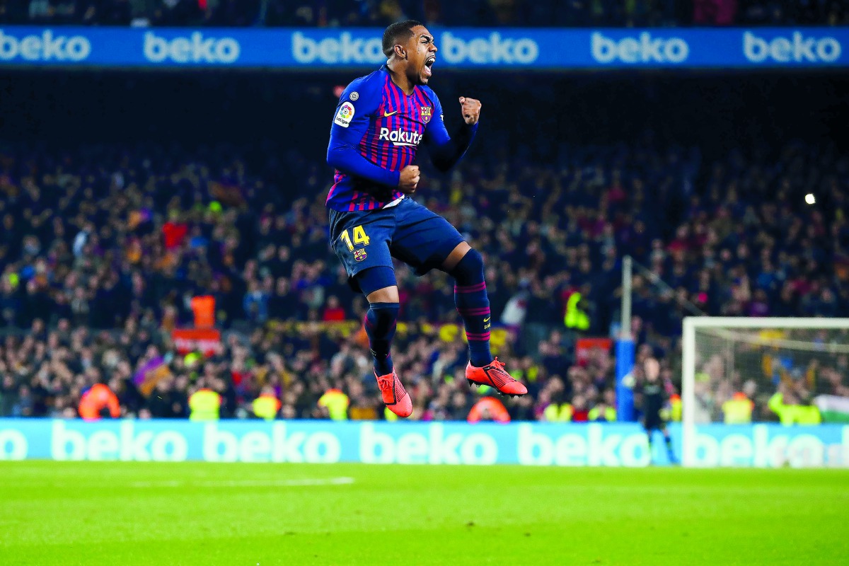 Barcelona's Brazilian forward Malcom Filipe celebrates after scoring a goal during Spanish Copa del Rey football match between FC Barcelona and Real Madrid at the Camp Nou stadium in Barcelona on February 6, 2019. (Adria Puig/Anadolu Agency)