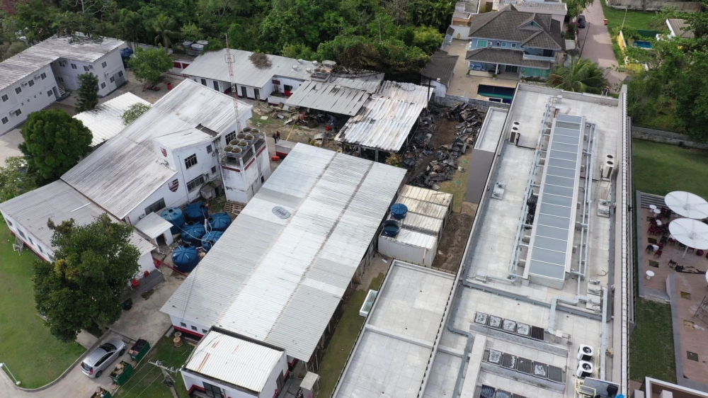Aerial view of the Brazilian Flamengo football club training center after a building that housed players aged 14 to 17 caught fire at dawn in Vargem Grande neighborhood, west of Rio de Janeiro, Brazil, on February 8, 2019. AFP / Marie HOSPITAL