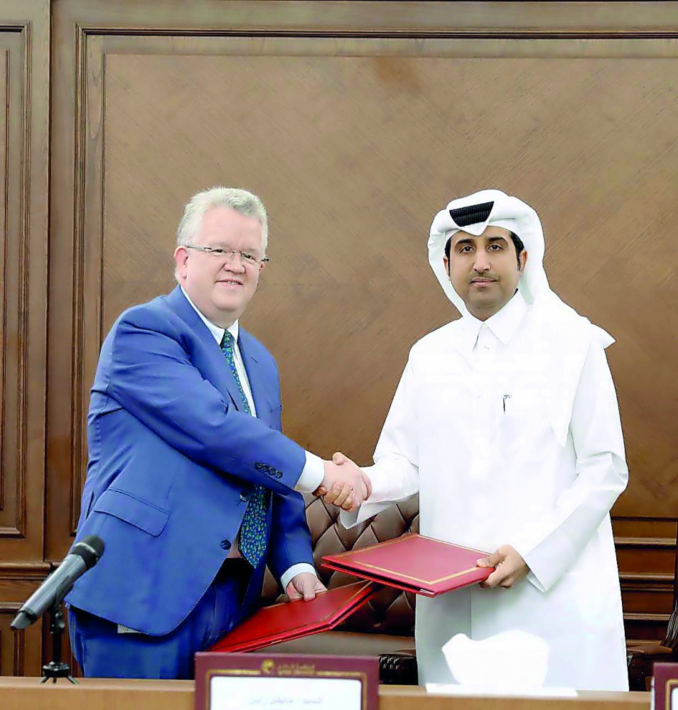 Michael G Ryan (left) and Saleh bin Hamad Al Sharqi during the MoU signing ceremony. 