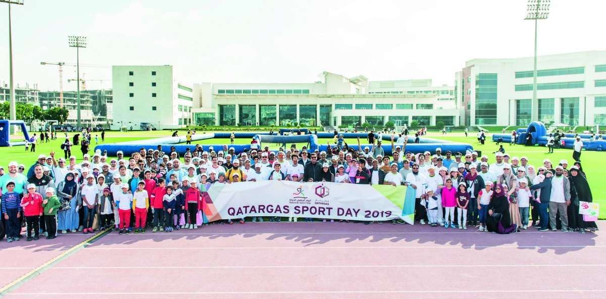 Qatargas management team, employees and family members, celebrating the National Sport Day in Aspire Zone, yesterday. 