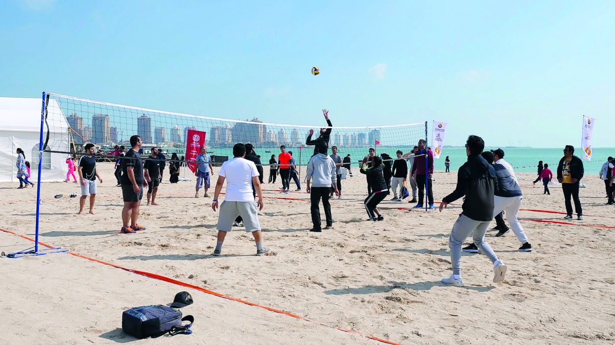 The members of the community playing beach volleyball, one of the number of sporting events organised by the Ministry of Commerce and Industry (MoCI), in cooperation with the Economic Zones Company (Manateq), to mark the National Sport Day, at Katara, yes