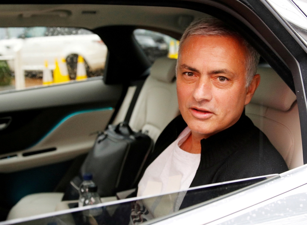 Jose Mourinho is driven away from his accommodation after leaving his job as Manchester United's manager, in Manchester, Britain, December 18, 2018. (REUTERS/Phil Noble/File Photo)