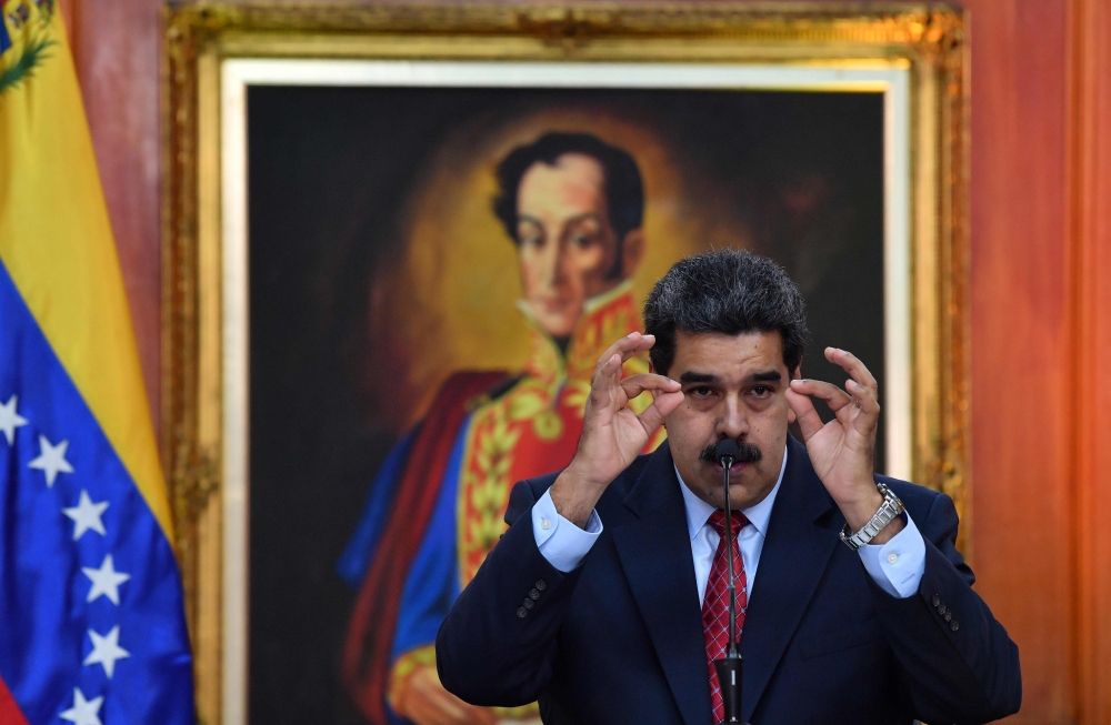 Venezuelan President Nicolas Maduro offers a press conference in Caracas on January 25, 2019. AFP/Yuri Cortez