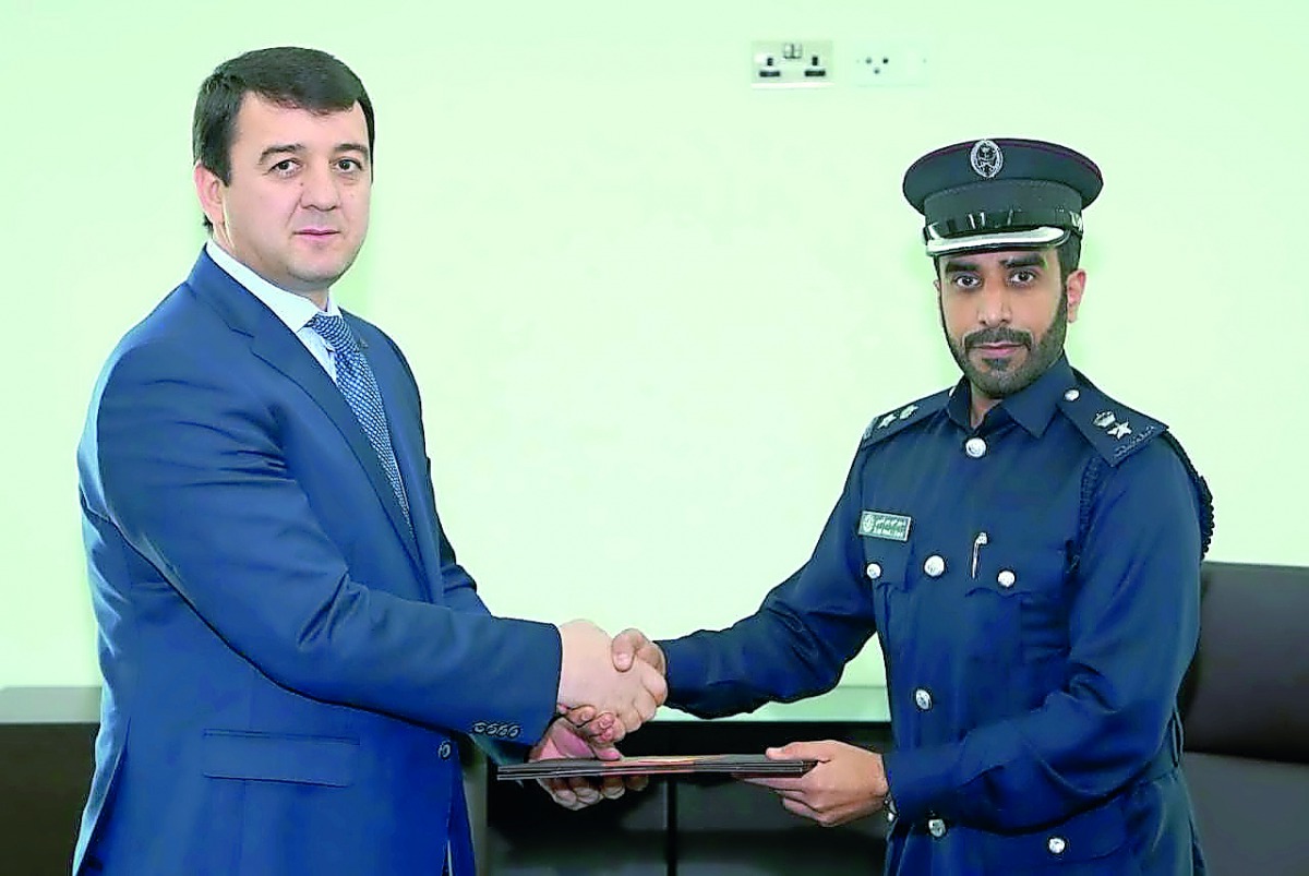 Major Jabr Hamoud Jaber Al Nuaimi, Director, Department of Administrative and Financial Affairs, with Colonel Mashrabzoda Jamshed, Head of executive office of the Tajik Minister of Internal Affairs.