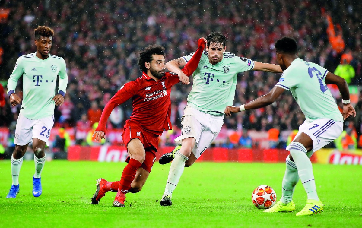  Bayern Munich's Javi Martinez in action with Liverpool's Mohamed Salah. Reuters/Phil Noble