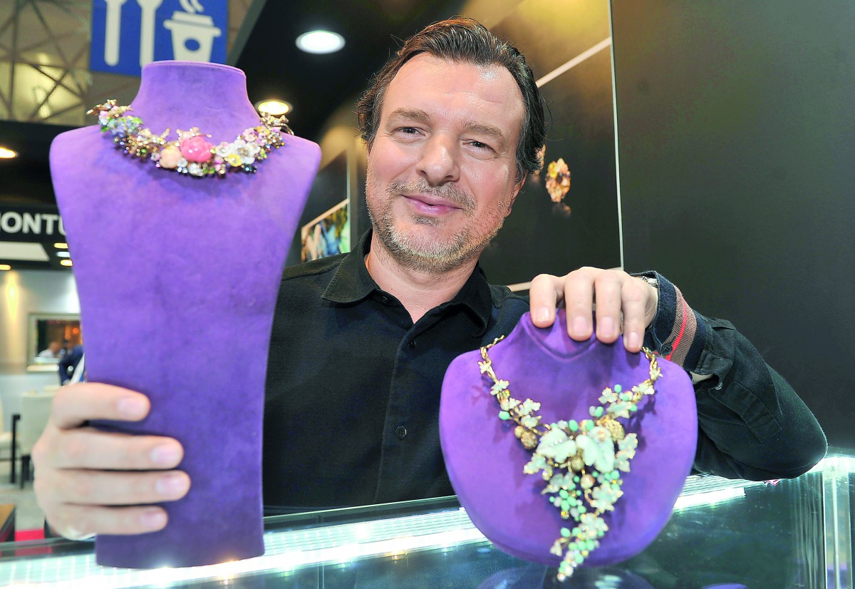 Gurkan Ozhanoglu, owner and designer of the Robi Diamond, displays the items during the Doha Jewellery and Watches Exhibition at DECC yesterday. Pics: Baher Amin / The Peninsula 