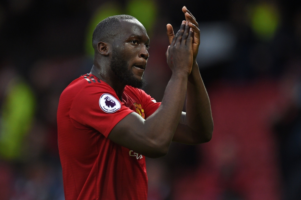 Manchester United's Belgian striker Romelu Lukaku applauds supporters on the pitch after the English Premier League football match between Manchester United and Southampton at Old Trafford in Manchester, north west England, on March 2, 2019.  AFP / Oli SC