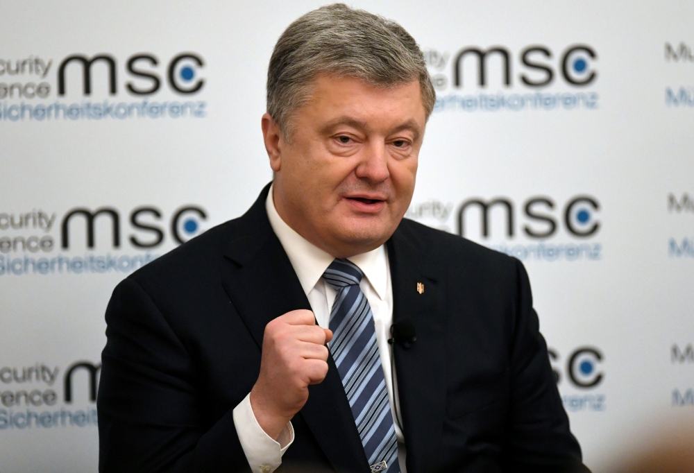 FILE PHOTO: Ukrainian President Petro Poroshenko speaks during the annual Munich Security Conference in Munich, Germany February 16, 2019. REUTERS/Andreas Gebert
