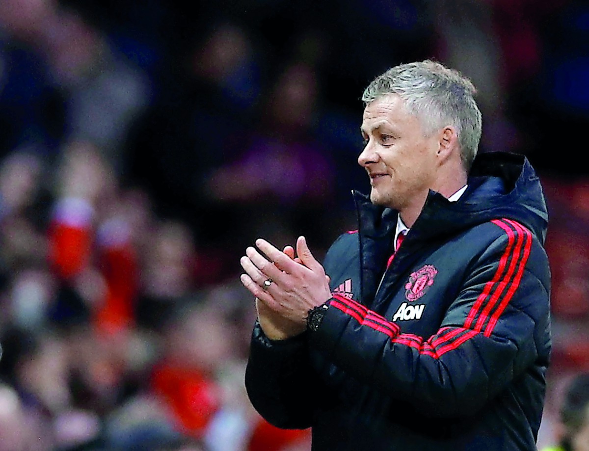 Manchester United interim manager Ole Gunnar Solskjaer applauds fans after the match. Reuters/Phil Noble