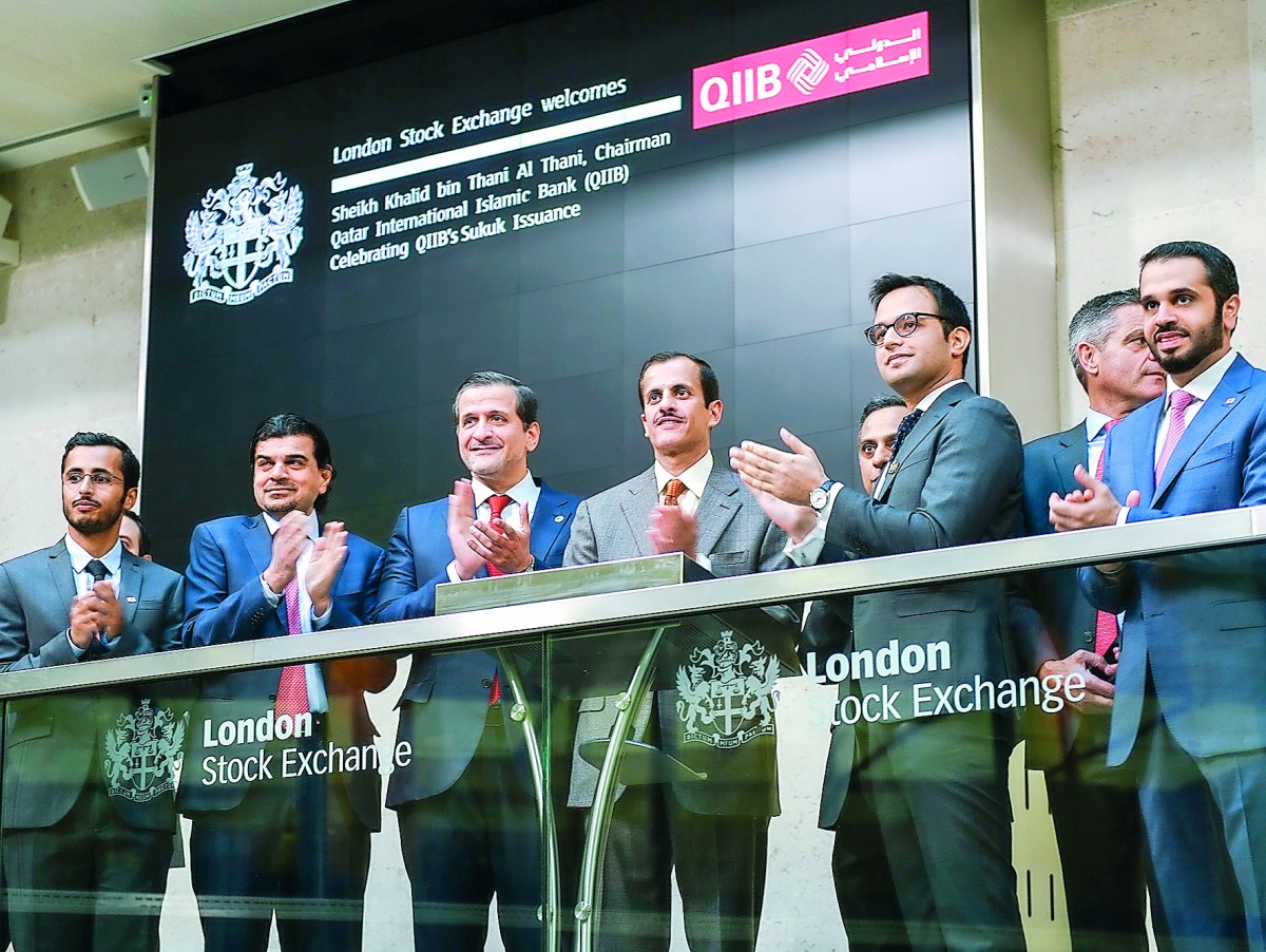 QIIB Chairman and Managing Director Sheikh Dr Khalid bin Thani Al Thani with other dignitaries during the listing of the bank's $500m Sukuk on the London Stock Exchange, yesterday.