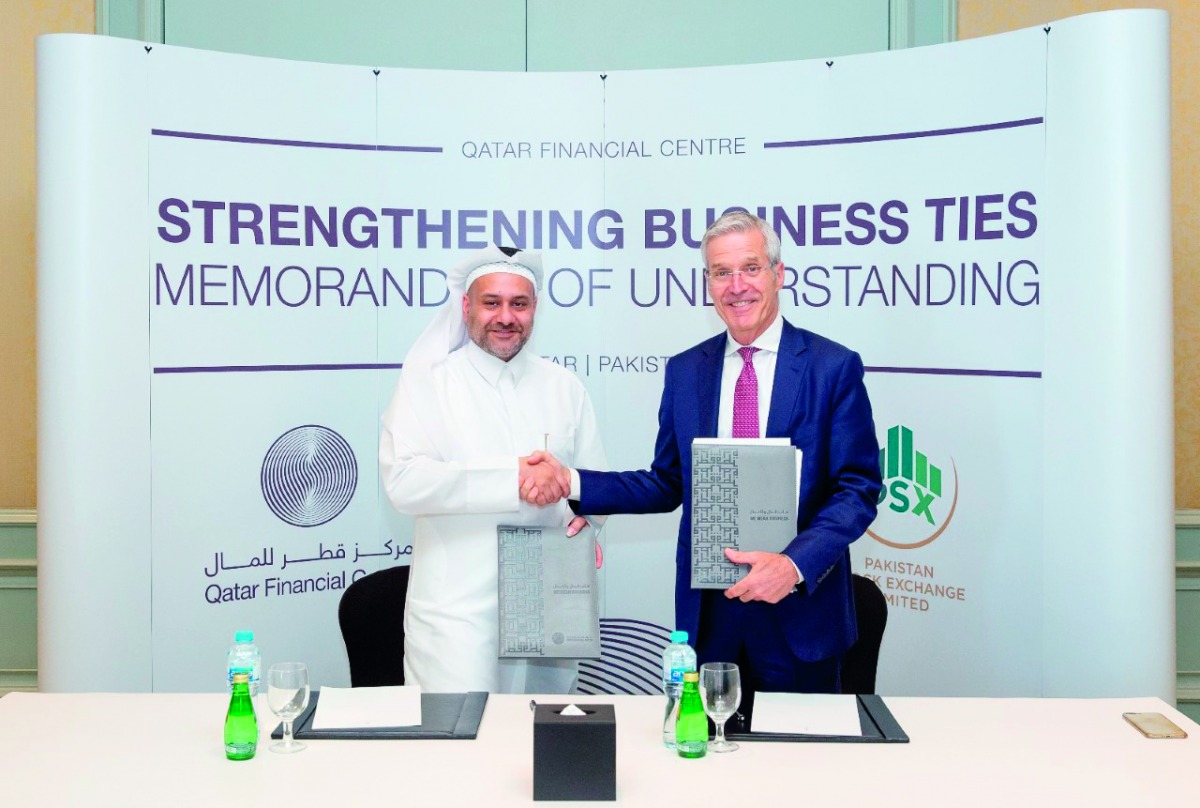 Yousuf Mohamed Al Jaida (left), Chief Executive Officer, QFC Authority; and  Richard Morin, Chief Executive Officer, Pakistan Stock Exchange during the signing ceremony.