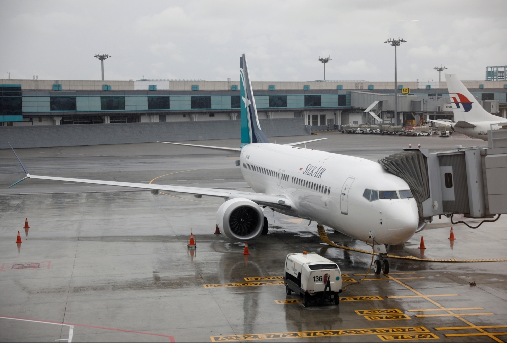 File photo of SilkAir's new aircraft, the Boeing 737 Max 8, sits on the tarmac at Changi Airport in Singapore October 4, 2017. REUTERS/Edgar Su/File Photo