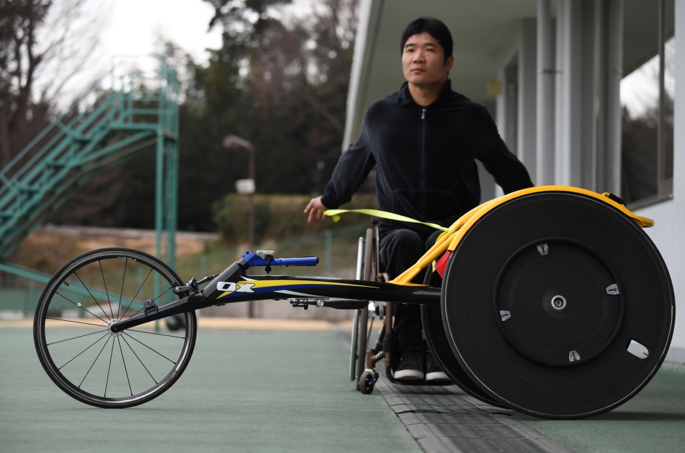 Japanese paralympian Masayuki Higuchi working out before the start of a training session at a track and field stadium in Noda, Chiba prefecture on February 13, 2019. AFP / Toshifumi Kitamura