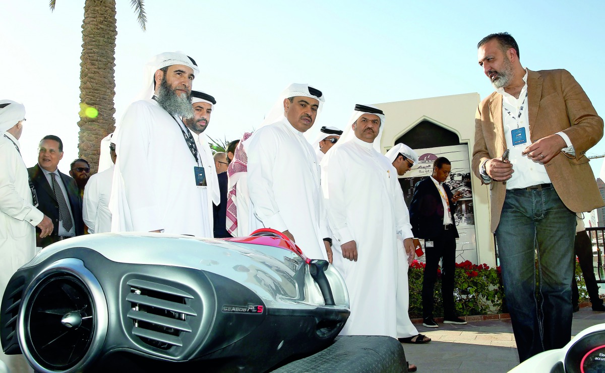 Minister of Commerce and Industry H E Ali bin Ahmed Al Kuwari tours the stalls at the 6th edition of Qatar International Boat Show which opened at The Pearl-Qatar Marina, yesterday. 
Pic: Qassim Rahmatullah / The Peninsula