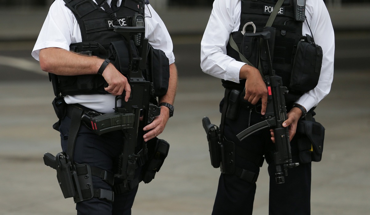 Armed police personnel patrol near London's Trafalgar Square on August 4, 2016. (AFP) 