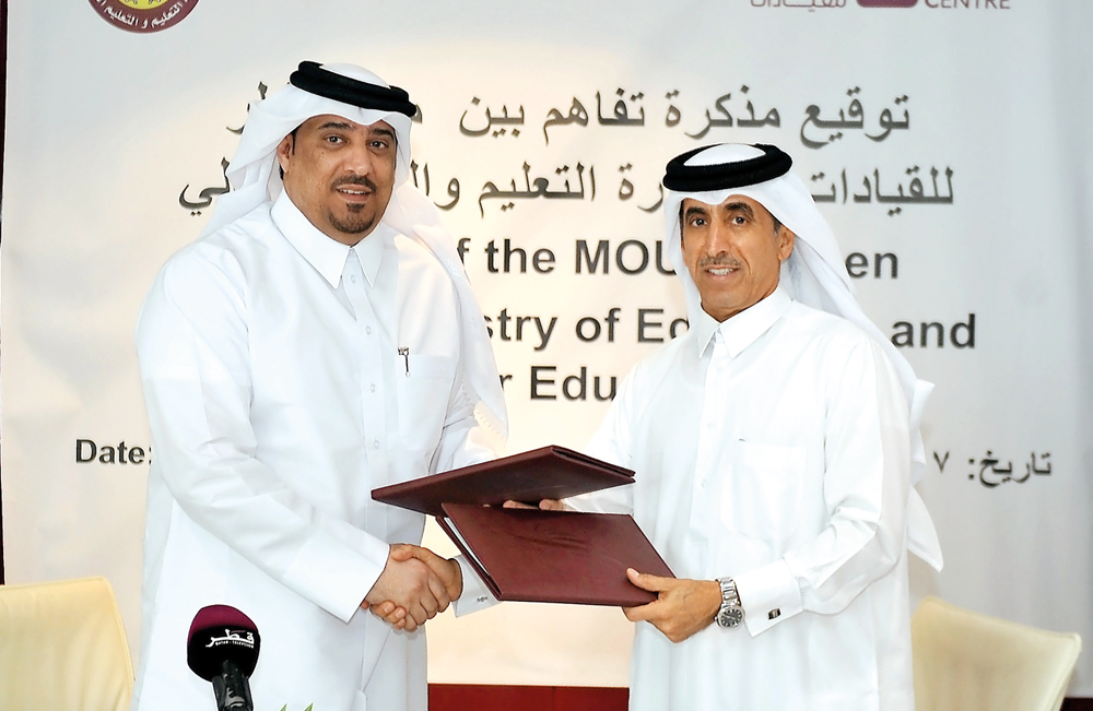 Dr. Ali Jassim Al Kubaisi (left), Acting Managing Director of Qatar Leadership Centre, with Dr Ibrahim bin Saleh bin Khalifa Al Nuaimi, Undersecretary of the Ministry of Education and Higher Education, during the signing ceremony at Qatar Leadership Centr