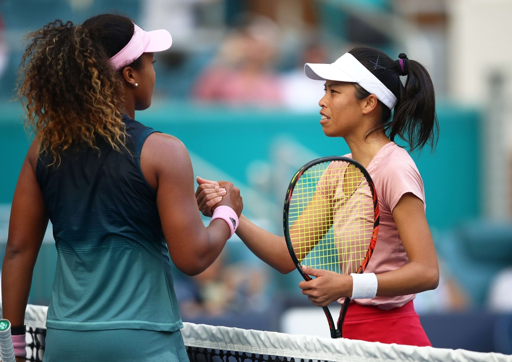 Su-Wei Hsieh of Taipei is congratulated by Naomi Osaka of Japan after their match during the Miami Open Tennis on March 23, 2019 in Miami Gardens, Florida. Julian Finney/Getty Images/AFP