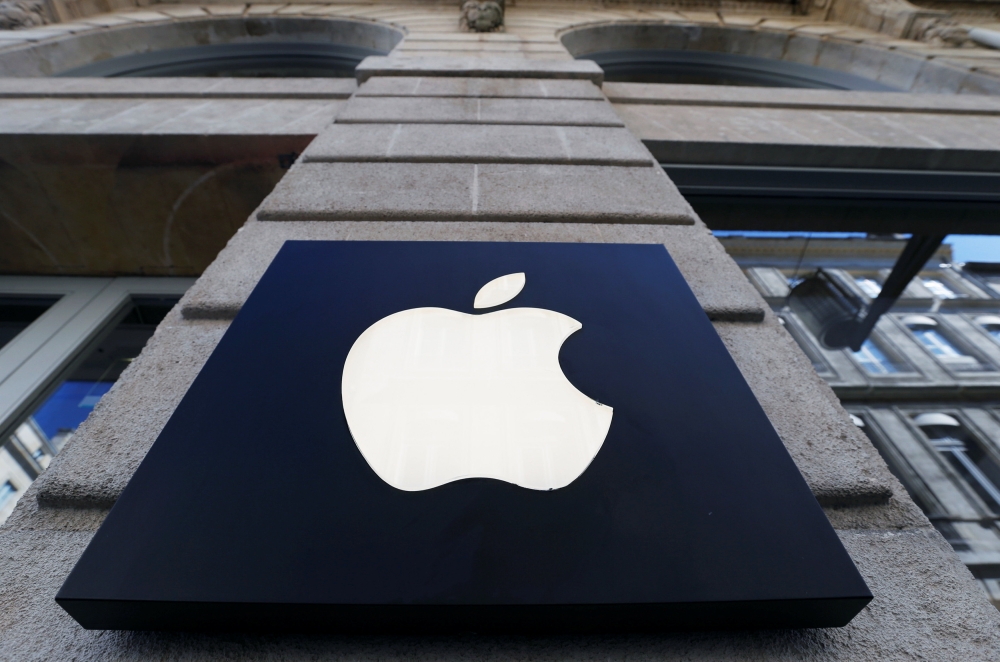 The logo of Apple company is seen outside an Apple store in Bordeaux, France, March 22, 2019. REUTERS/Regis Duvignau