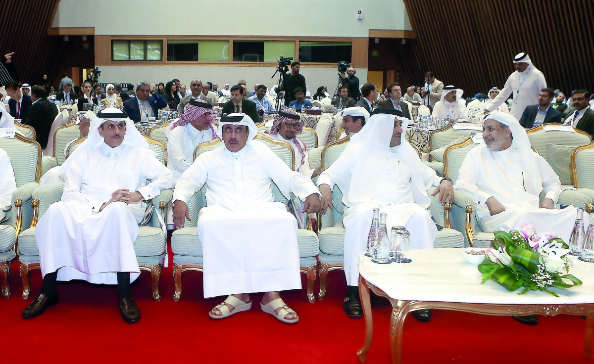 H E Jassim bin Saif Al Sulaiti, Minister of Transport and Communications (second left), with Sheikh Dr Khalid bin Thani Al Thani (left); Abdullatif Al Mahmoud (right), Group CEO, Dar Al Sharq; and other guests during the opening session of Supply Chains M