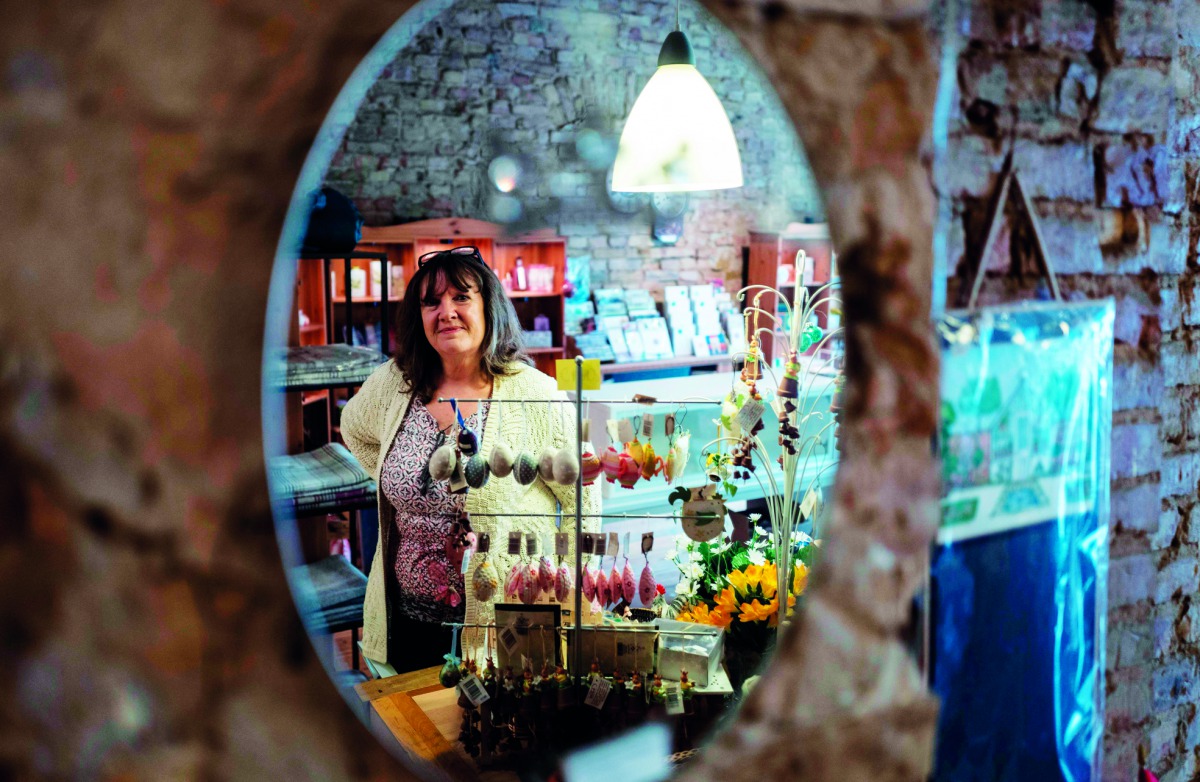 The owner, Dale Carr, poses at her shop 