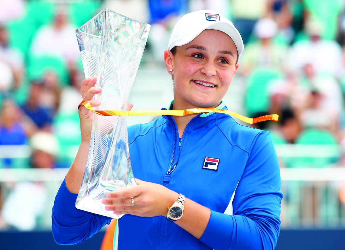  Ashleigh Barty of Australia celebrates with the trophy after her win against Karolina Pliskova of Czech Republic in the final during day thirteen of the Miami Open tennis on March 30, 2019 in Miami Gardens, Florida. Julian Finney/Getty Images/AFP