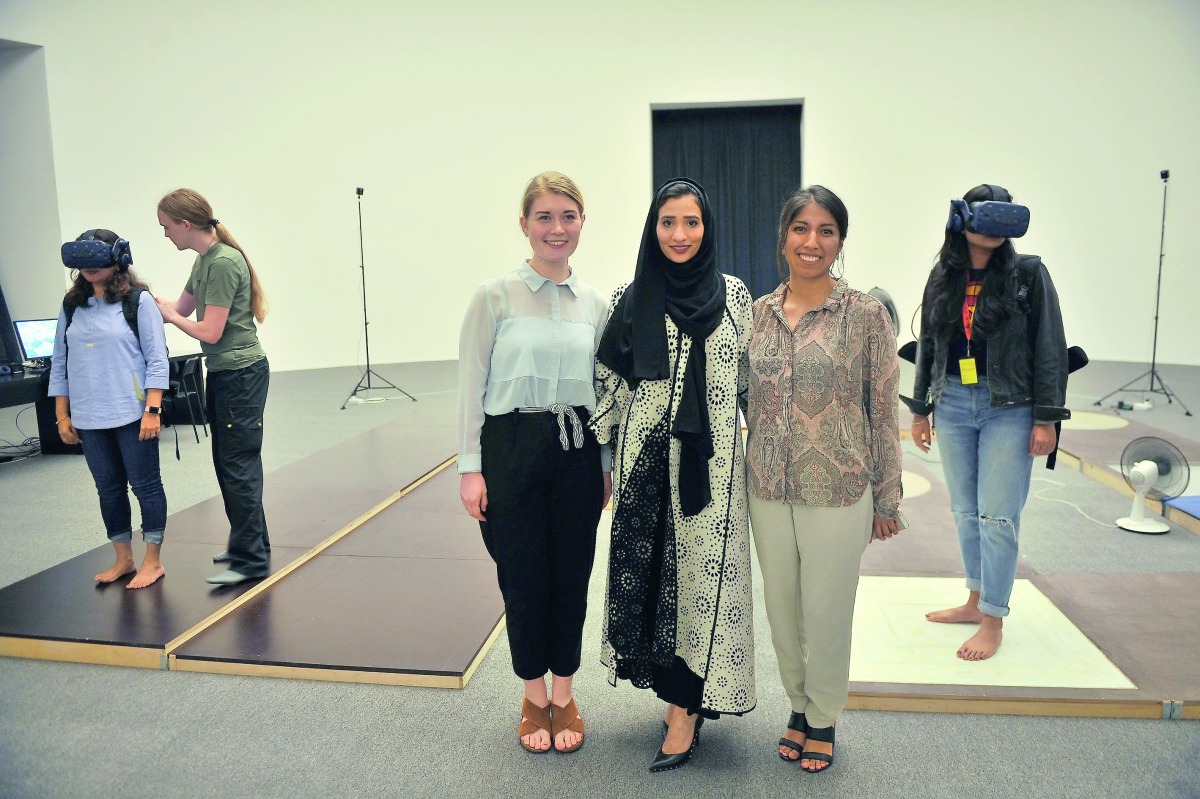 Sheikha Reem Al Thani (centre), Director of Exhibitions at Qatar Museums; and Maria Herholdt Engermann (right) and Signe Ungermand, co-founders of MANND, during a press preview of the VR film ‘X-Ray Fashion’ at Qatar Museums Gallery AlRiwaq yesterday.  Pi