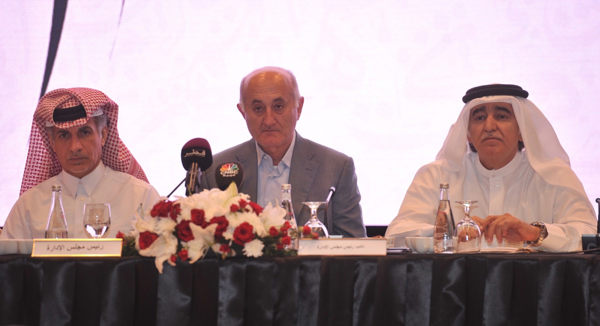 Issa Abdul Salam Abu Issa (centre), Chairman of Salam International Investment Ltd (SIIL), and other board members, during the Company’s General Assembly Meeting held at The Gate Mall, yesterday. 
Pic; Baher Amin / the peninsula