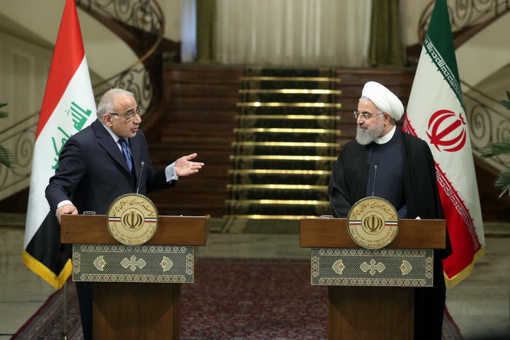 Iranian President Hassan Rouhani (R) and Iraqi Prime Minister Adel Abdel Mahdi speaking at a joint press conference in the Iranian capital Tehran.