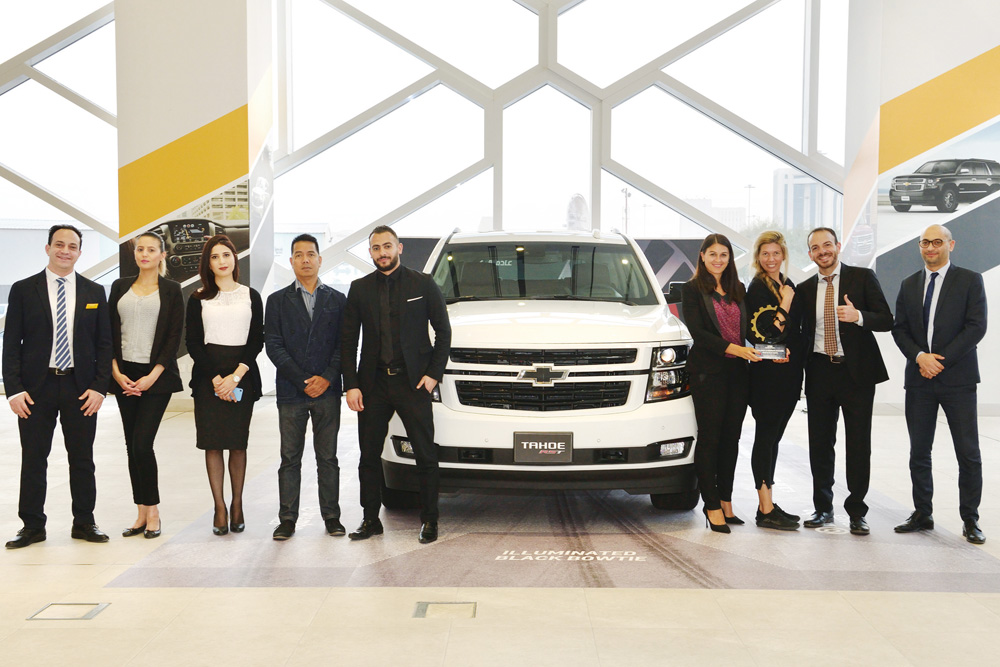 The Chevrolet team members pose for a group photo.