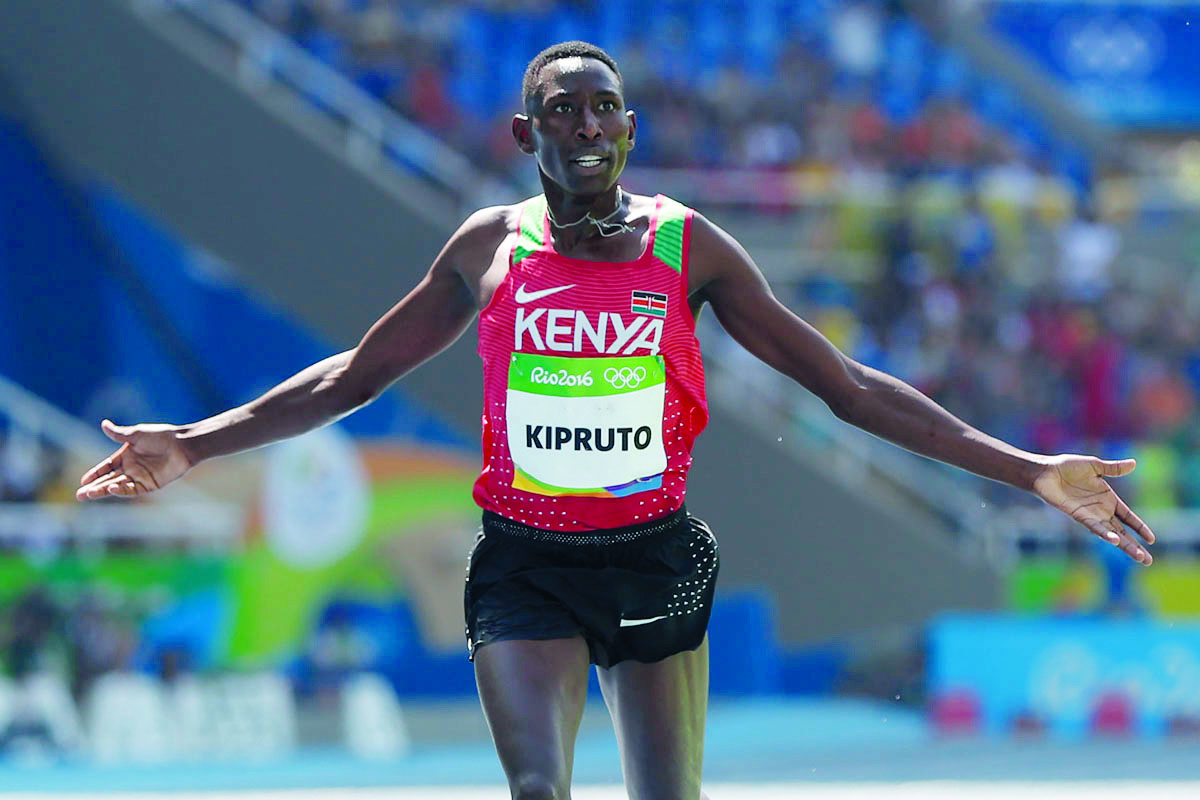 Kenya’s Conseslus Kipruto celebrates after winning the Men’s 3000m Steeplechase Final during the athletics event at the Rio 2016 Olympic Games at the Olympic Stadium in Rio de Janeiro in this August 17, 2016 file picture.  