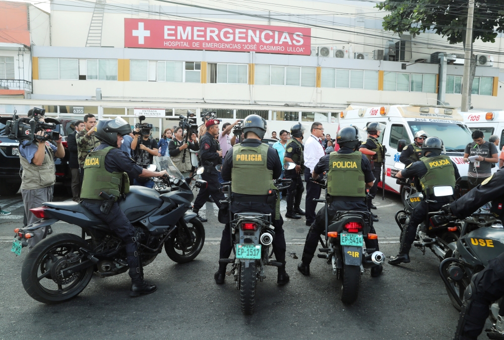 Police arrives outside a hospital where Peru's former President Alan Garcia was taken after he shot himself, in Lima, Peru April 17, 2019. REUTERS/Guadalupe Pardo