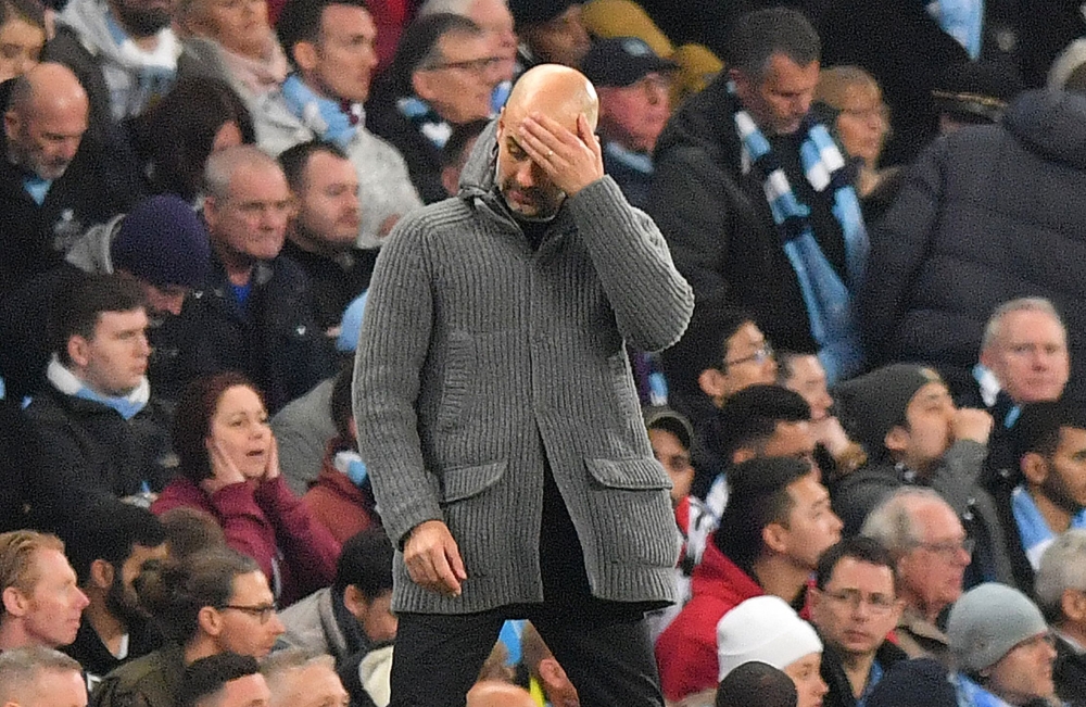 Manchester City's Spanish manager Pep Guardiola reacts during the UEFA Champions League quarter final second leg football match between Manchester City and Tottenham Hotspur at the Etihad Stadium in Manchester, north west England on April 17, 2019.  AFP /