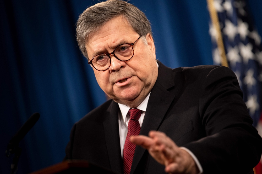 US Attorney General William Barr speaks about the release of the Mueller Report at the Department of Justice, April 18, 2019 in Washington DC. AFP/Brendan Smialowski