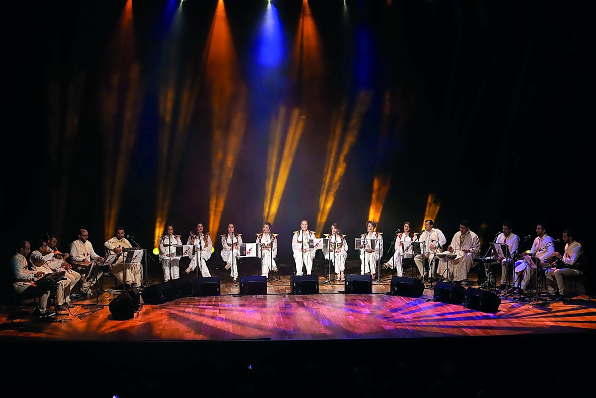 A Tunisian music band performs during the “Malouf Al Khadraa” music night held at Katara Drama Theatre.