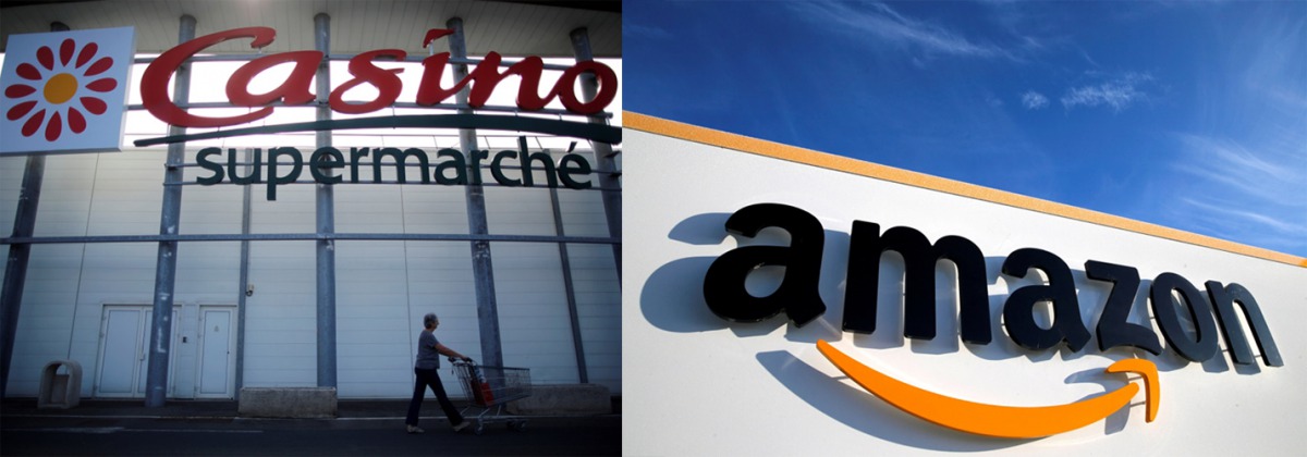 File photos of logo of French retailer Casino is pictured outside a Casino supermarket in Nantes, France, July 20, 2017. REUTERS/Stephane Mahe and the logo of Amazon is seen at the company logistics centre in Boves, France, Jan. 19, 2019. REUTERS/Pascal R
