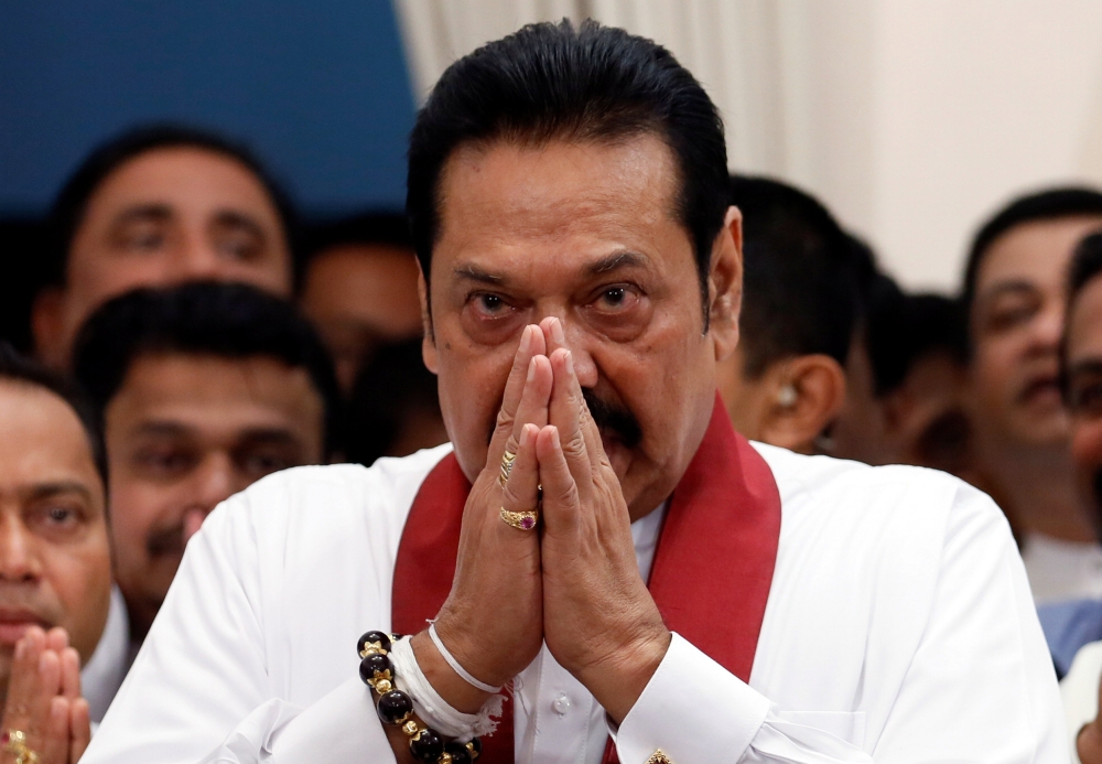 Sri Lanka's newly appointed Prime Minister Mahinda Rajapaksa gestures during the ceremony to assume duties at the Prime Minister's office in Colombo, Sri Lanka October 29, 2018. Reuters/Dinuka Liyanawatte