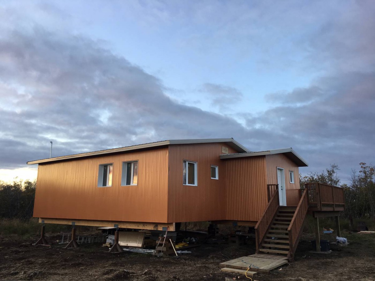A view of an energy efficient house with a waterless toilet and gravity fed water system in southwest Alaska. Credit: Cold Climate Housing Resarch Center/Jack Hébert