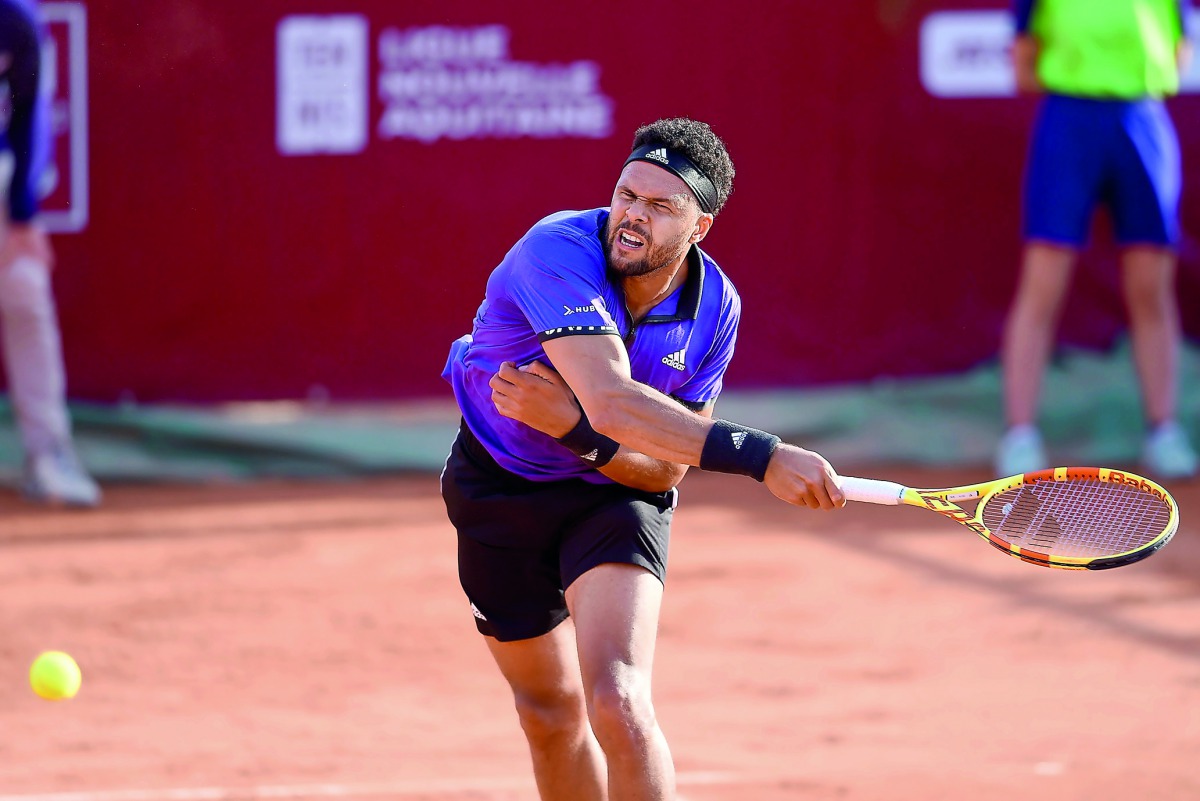 France's Jo-Wilfried Tsonga hits a return during his men's singles 2nd round match against Serbian Victor Troicki on day 2 of the ATP Challenger Tour tennis tournament in Bordeaux on April 30, 2019. AFP / Nicolas Tucat
