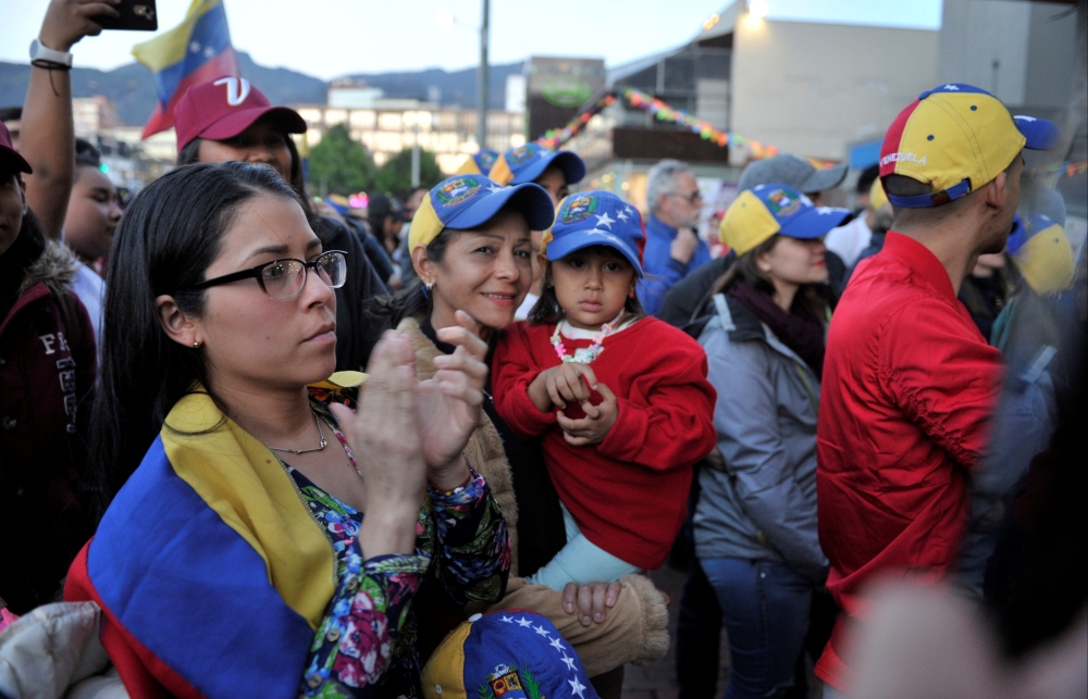 Venezuelan residents in Colombia protest against Venezuelan President Nicolas Maduro's government in Bogota, Colombia, May 1, 2019. Reuters/Carlos Julio Martinez
