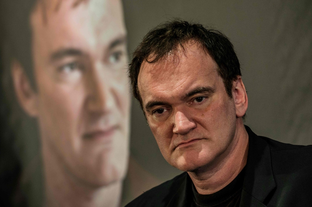 In this file photo taken on October 15, 2013 US film director Quentin Tarentino attends the press conference of the opening day of the fifth edition of the Festival Lumiere on October 15, 2013 in Lyon.  AFP / Jeff Pachoud 
