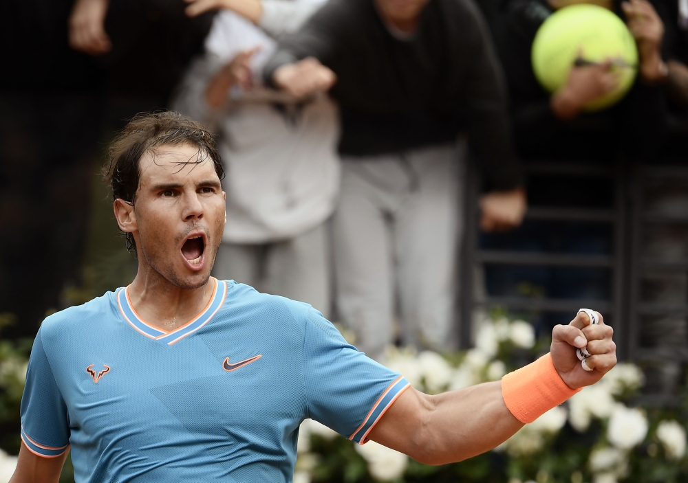 Rafael Nadal of Spain celebrates after winning against Greece's Stefanos Tsitsipas during their ATP Masters tournament semi final tennis match at the Foro Italico camp in Rome, on May 18, 2019. (AFP / Filippo MONTEFORTE)