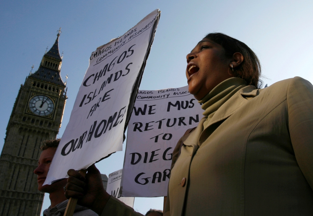 A demonstrator demanding her return to the Chagos Islands in the Diego Garcia archipelago shouts during a protest outside the Houses of Parliament in London, October 22, 2008. Reuters/Andrew Winning