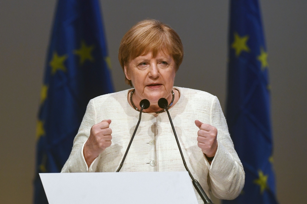 German Chancellor Angela Merkel gives a speech during the last pre-European elections meeting of the European People's Party (EPP), in Munich, southern Germany, on May 24, 2019. / AFP / Christof STACHE 