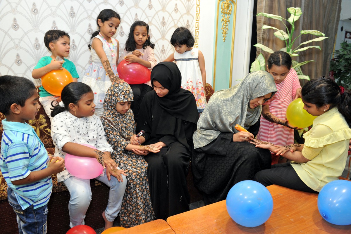 Elders put henna on kids’ palms in Doha on the eve of Eid Al Fitr celebrations which is set to  start on July 4, 2019. Pic: Salim Matramkot/The Peninsula 
