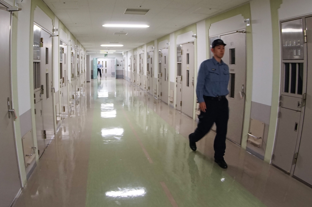 This picture taken during a media tour shows a corridor which leads to individual cells at the Tokyo Detention House on June 10, 2019. 